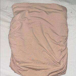 Elegant tan a new day tube top